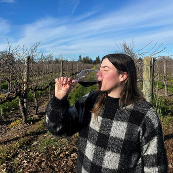 Michelle sipping HANNA Two Ranch Red Blend