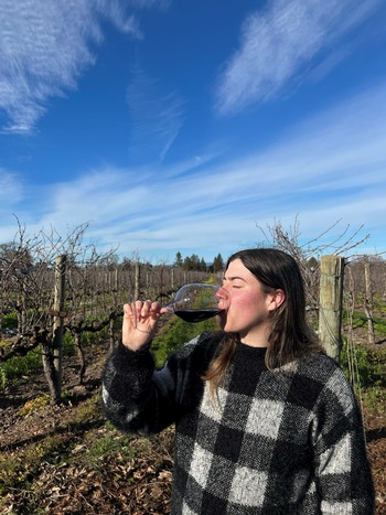 Michelle sipping HANNA Two Ranch Red Blend
